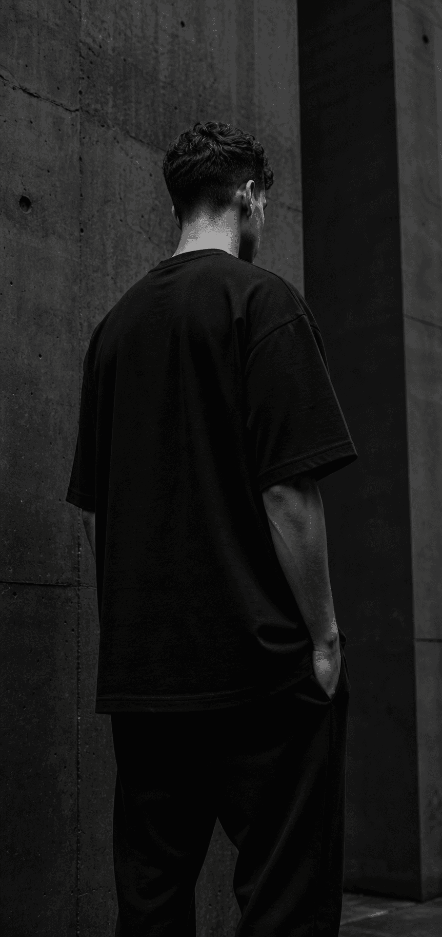 Model wearing an oversized Mind Zone black T-shirt